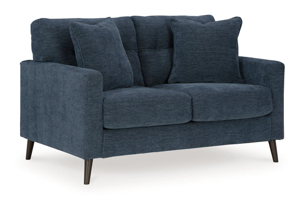 Feed your mid-century modern nostalgiaâ€”with a contemporary twist. A vibrant trend-right hue and comfy feel make this loveseat perfect for lounging solo or with friends and family. Its linear profile adds plenty of fresh style, and the tapered accent leg