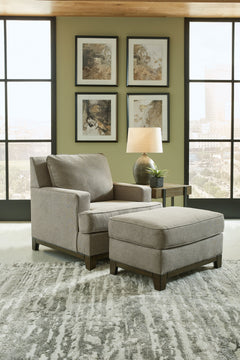 For a fresh spot in your space, turn to this designer chair and ottoman. Wind down at the end of a long day when you sink into this canyon of comfort. <h4><b>Kaywood - Granite - Chair</b></h4> <table width=-"100%-"><colgroup><col style=-"width: 30%