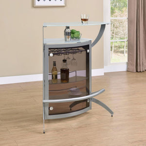  this magnificent metal bar unit is the perfect upgrade to any room where guests may gather. Its versatile design provides a variety of convenient options for your entertaining needs. The contemporary curve