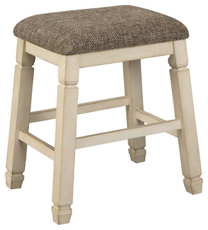 The beauty of this upholstered bar stool is something to savor. Designed to serve up comfort and flair, this backless bar stool entices with a saddle seat covered in a heavy woven fabric that complements the antiqued white finish.<br><br><b>Additional Dim