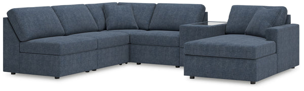 Looking cool and contemporary is great. But when it comes down to it, youâ€™re all about low-maintenance lounging. With the performance fabric on this sectional with chaise, cleaning spills is a breeze. Its customizable modular design caters to your ever-