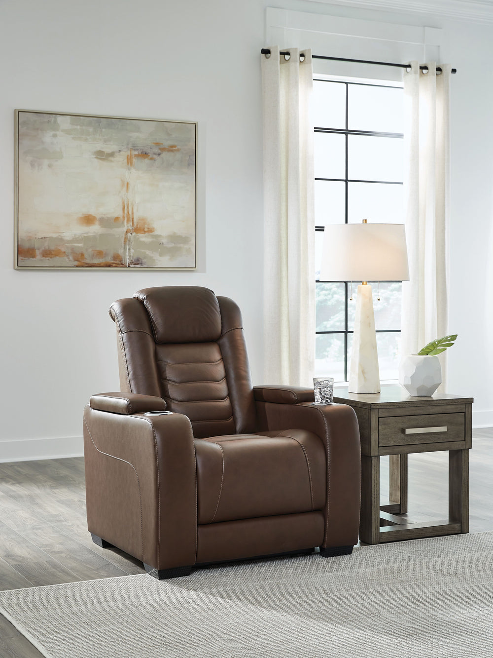 Talk about having it all. This power recliner entices with a luxe look and fabulous feelâ€”and satisfies with high-end style at an affordable price. Sleek and stylish, this impressive seating offers the convenience of one-touch power controls along with U
