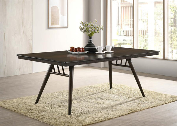  this beautiful and spacious dining table brings a retro expression. A spacious rectangular table top with a bullnose edge and a fluted apron beneath offers plenty of room for six family members and guests.