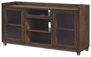 For fans of urban industrial design, this XL TV stand clearly steals the show. Its blend of acacia veneer and wood is beautified with an oiled walnut-tone finish for a highly contemporary aesthetic with grainy, earthy character. Infusion of dark bronze-to