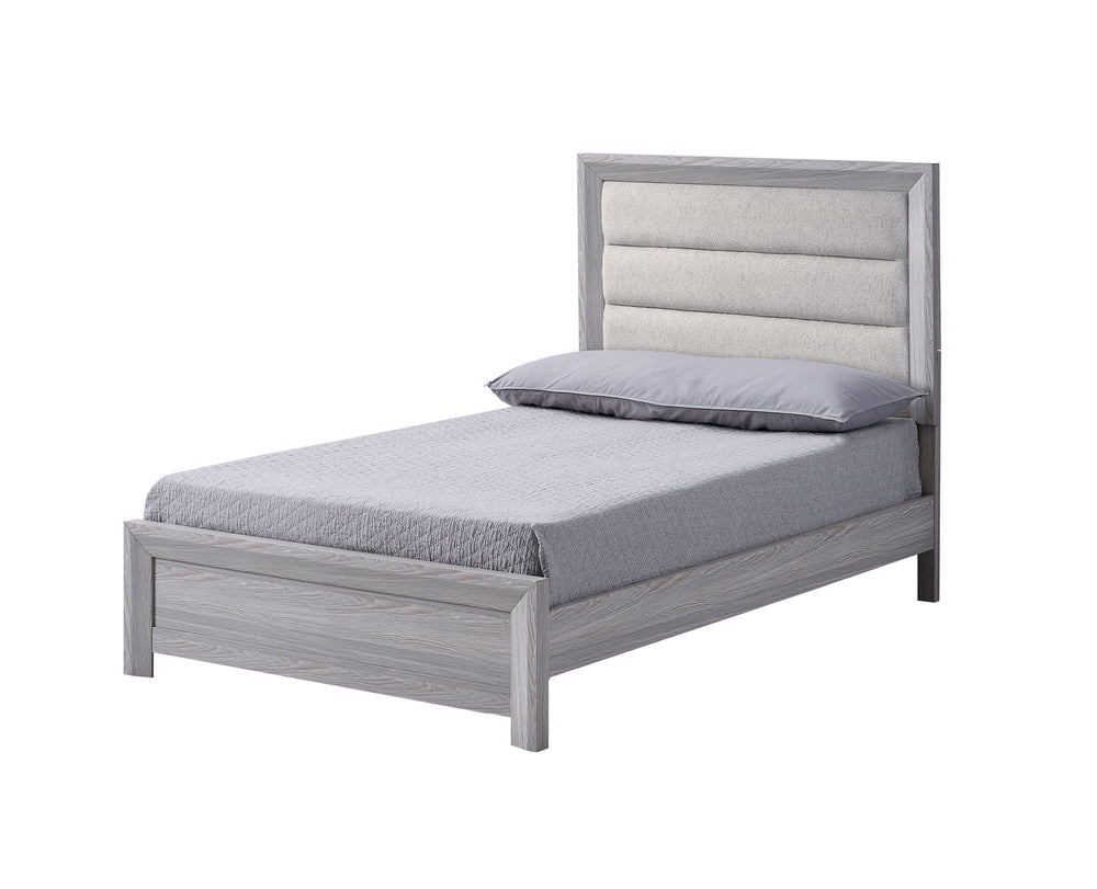 This bedroom set is the embodiment of understated sophistication, featuring a neutral drift wood finish that complements its clean and contemporary design. The robust bed frame anchors the room with a sense of sturdiness and style. Accompanying the bed ar