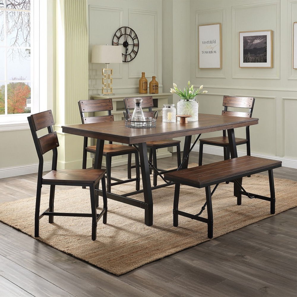 The industrial chic Mariatu wood and metal Bench has a vintage style to enhance any space. The design aesthetic of this handcrafted bench includes a metal frame in a black finish. A rectangular wood top in an oak wood finish contrasts nicely.<br/><br/><b>
