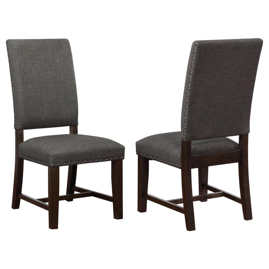 Simple, yet elegant Parsons chair is a welcome addition to your home. Regardless of dÃ©cor, this side chair fits in seamlessly. Upholstered in sumptuous warm grey fabric. Characteristically armless for an easy getaway to the kitchen to check on your signa