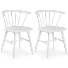 Bring light to your dining area with clean lines and a bright, white finish. The dining room chair sports a low spindle back with turned legs for beautiful simplicity. This functional piece marries minimalism with big style for a delightful combination.<b