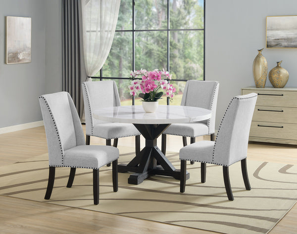 A fresh take on a traditional silhouette makes this group a great addition to your dining space. A genuine marble top is luxurious and timeless. Farmhouse style cross legs are updated in a contemporary charcoal finish. The upholstered dining chairs featur