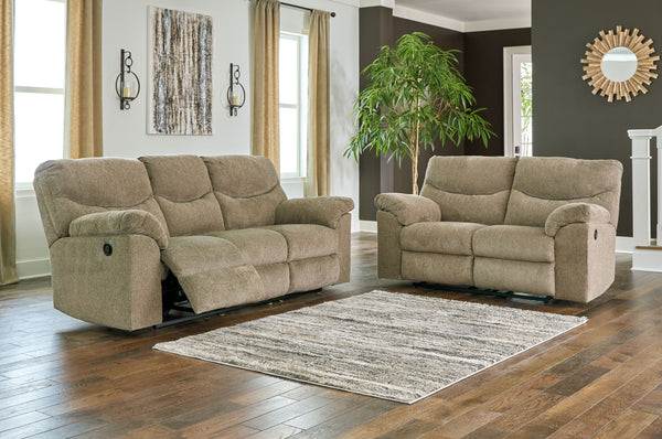 Sincere in its styling, this reclining sofa and loveseat invite a relaxed sensibility into your space. Its beige upholstery has a universal appeal, with pull-tab reclining making it easy to kick back in comfort. Providing high-quality functionality at an 