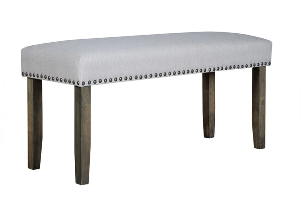Introducing the Julius Bench, a durable and versatile addition to your dining set or entryway. Crafted from solid rubberwood and ash veneers, this bench promises strength and stability. The multi-step walnut brown finish enhances the natural wood grain, a