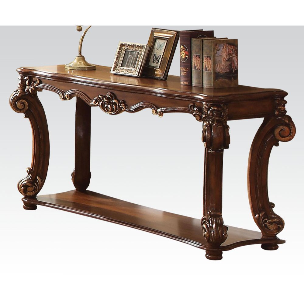 KD, Rectangular Table w/Scrolled Leg and Bottom Shelf â€¢ Top Apron: Scrolled Decor Trim<br/><br/><b>Product Features</b><ul><li>Case: 1Pc/1Ctn</li><li>Finish: Cherry</li><li>Style: Vintage</li><li>Materials: Wood, Poly Resin, Veneer (Wood)</li></ul><br/>