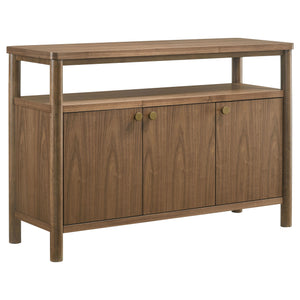 Add easy style and ample storage to your dining room with a modern wooden sideboard with three doors. An open shelf adds easy display space beneath the tabletop, perfect for seasonal accessories that enhance a personalized look and feel. The sideboard fea