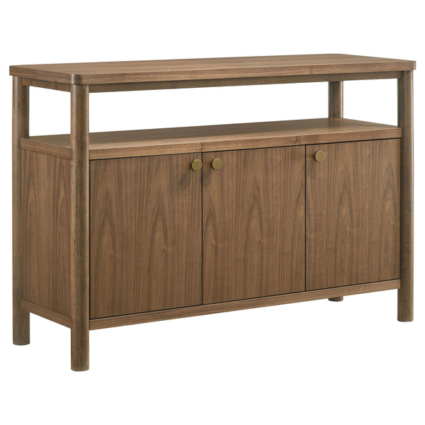 Add easy style and ample storage to your dining room with a modern wooden sideboard with three doors. An open shelf adds easy display space beneath the tabletop, perfect for seasonal accessories that enhance a personalized look and feel. The sideboard fea