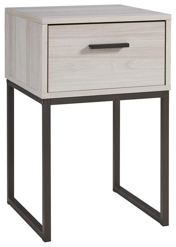 Light and bright, this nightstand is inspired by chic design. A light natural finish over replicated oak grain offers an authentic touch to this so-cool piece. It beautifully blends the hues of natural living with the edginess of your modern lifestyle.<br