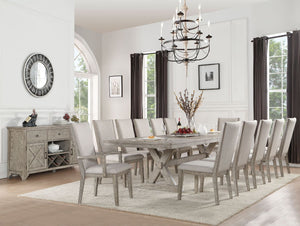 This Rocky dining collection will be an ideal set for any dining room. Featuring in gray oak finish, the dining table with trestle base and its matching chair create a rustic style look to your dining space. A matching server with wine rack is also availa