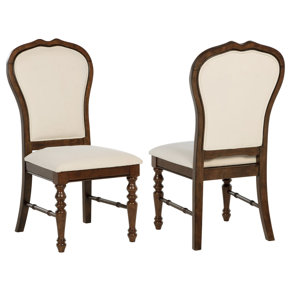 Complement your chic dining ensemble with a set of two traditional dining side chairs. Each boasts durable construction in Asian hardwood, complete with a rich brown finish. Chairs are designed with decorative rounded backs, framed in wood to create defin