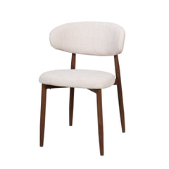 The Royce Side Chair set offers a stylish and practical seating solution with a distinct mid-century modern flair. Each set includes two side chairs featuring a gracefully curved back and sleek, low-profile design that adds a refined touch to any dining o