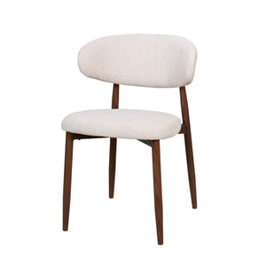The Royce Side Chair set offers a stylish and practical seating solution with a distinct mid-century modern flair. Each set includes two side chairs featuring a gracefully curved back and sleek, low-profile design that adds a refined touch to any dining o