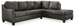 Luxurious lounging, everyday affordability. This sectional prioritizes comfort that suits your modern lifestyle. Its combination of leather and faux leather upholstery indulges you in soft seating, with subtle dimension added by natural pebble detailing. 