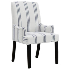 This armchair adds a refined yet relaxed charm to your dining space, blending comfort with casual elegance. Upholstered in linen-like beige fabric with blue stripes, it offers a timeless aesthetic. The padded seat, backrest, and gracefully curved arms ens