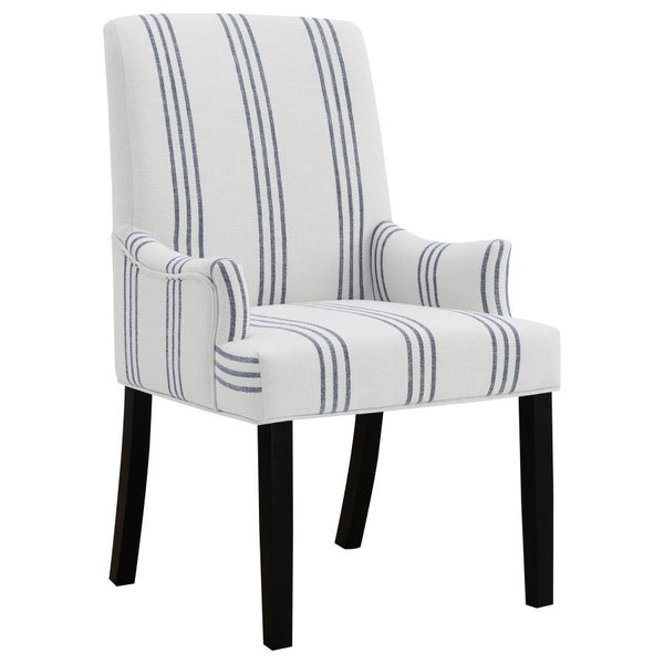 This armchair adds a refined yet relaxed charm to your dining space, blending comfort with casual elegance. Upholstered in linen-like beige fabric with blue stripes, it offers a timeless aesthetic. The padded seat, backrest, and gracefully curved arms ens