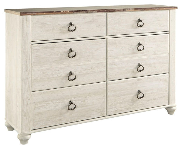 This dresser is the ultimate statement piece for your coastal cottage or shabby chic inspired retreat. A whitewash finish on the drawers and sides is wonderfully easy on the eyes. Paired with the unique plank-effect top, itâ€™s a driftwoody look that has 