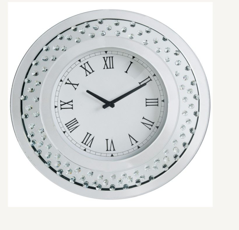 Round Clock (Wall) Beveled Mirrored Finish, Clear Glass & Faux Crystal Inlay Clock Mechanism: Quartz, Battery Required: 1A Not Included Chime Sound: Not Included (Low Ticking) Dial Numeral Type: Roman<br/><br/><b>Product Features</b><ul><li>Wall Clock</li