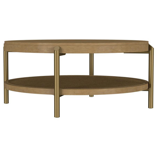 This round coffee table combines modern design with rustic charm, perfect for todayâ€™s living spaces. Crafted with Asian hardwood, engineered wood, and ash veneer, its smooth finish highlights the natural wood grain for an organic appeal. The lower shelf