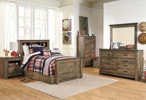  plank-style details and nailhead trim pay homage to reclaimed barn wood