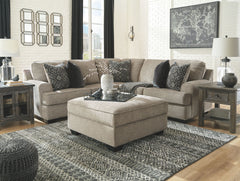 Whether your style is clean and contemporary or cozy modern farmhouse, this generously sized set in a stone-tone neutral upholstery has the corner on style. <h4><b>Bovarian - Stone - LAF Loveseat</b></h4> <table width=-"100%-"><colgroup><col style=-"width