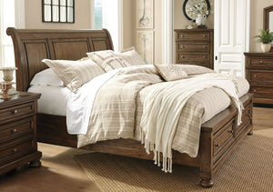  new take on traditional style. This queen sleigh bed meets todayâ€™s design tastes with beauty and grace. Tobacco brown finish allows the natural grain of the acacia veneers to show through in an organic way. Aged brass-tone knobs dress the front