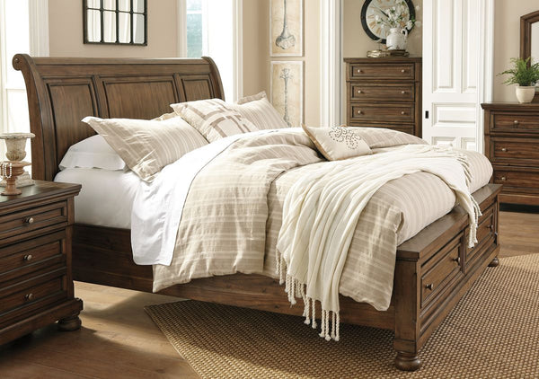  new take on traditional style. This queen sleigh bed meets todayâ€™s design tastes with beauty and grace. Tobacco brown finish allows the natural grain of the acacia veneers to show through in an organic way. Aged brass-tone knobs dress the front