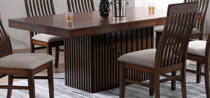  creating a larger table perfect for guests. The table is crafted with Asian hardwoods and receives a man