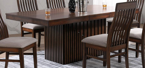  creating a larger table perfect for guests. The table is crafted with Asian hardwoods and receives a man