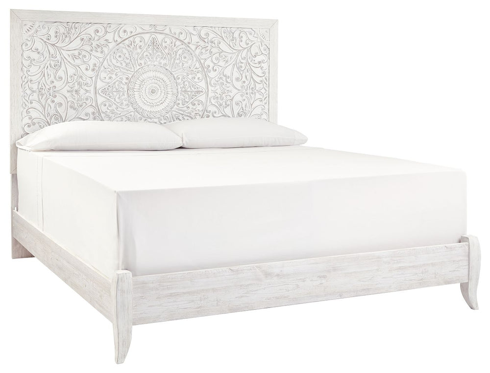 Showcase your trend-setting spirit with this bed. Inspired by bohemian tapestries, exquisite carved medallion pattern is a testament to boho-chic style. Whitewash finish sets a foundation for a room bursting with personality. <h4><b>Paxberry - Whitewash -