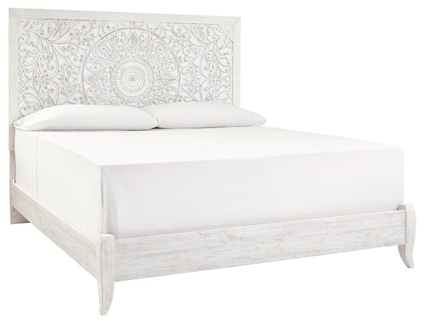 exquisite carved medallion pattern is a testament to boho-chic style. Whitewash finish sets a foundation for a room bursting with personality. <h4><b>Paxberry - Whitewash -