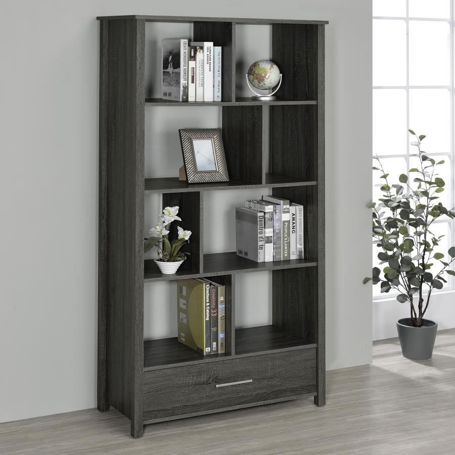 Asymmetrical shelves stack against one another to create this stunning, contemporary bookcase. A stylish, eye-catching addition to a home office, this minimalist bookcase invites you to organize office accessories or showcase decor and family photos. Eigh
