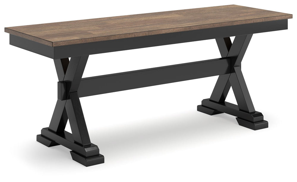 Raise the bar on modern farmhouse style with this dining bench. Its casual good looks are accentuated with a handsome two-tone finish. A sturdy silhouette adds a hearty element, whether your style is vintage, country or eclectic. This richly crafted seati