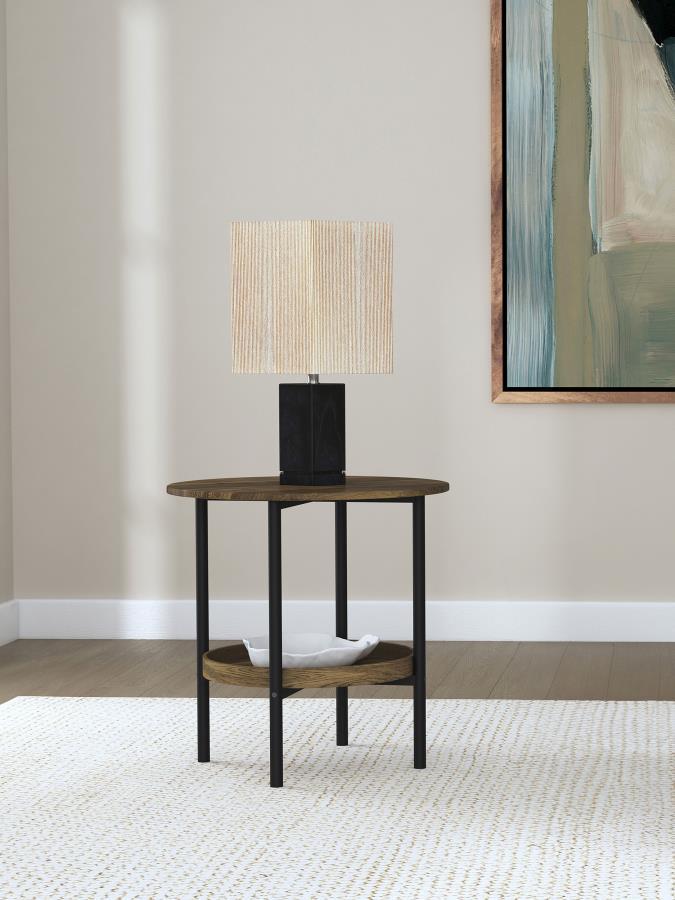 Complement your living space with the stylish, understated design of this transitional round end table. Its simple, clean lines exude farmhouse charm, with a neutral brown wood finish that brings warmth to any room. The round silhouette creates a sense of
