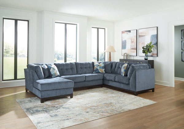  on-trend style meets functionality in this sectional with chaise. Details like tufted cushions and a wrap-around accent base reflect your urban contemporary tastes while staying versatile as your style changes. And with its soft upholstery