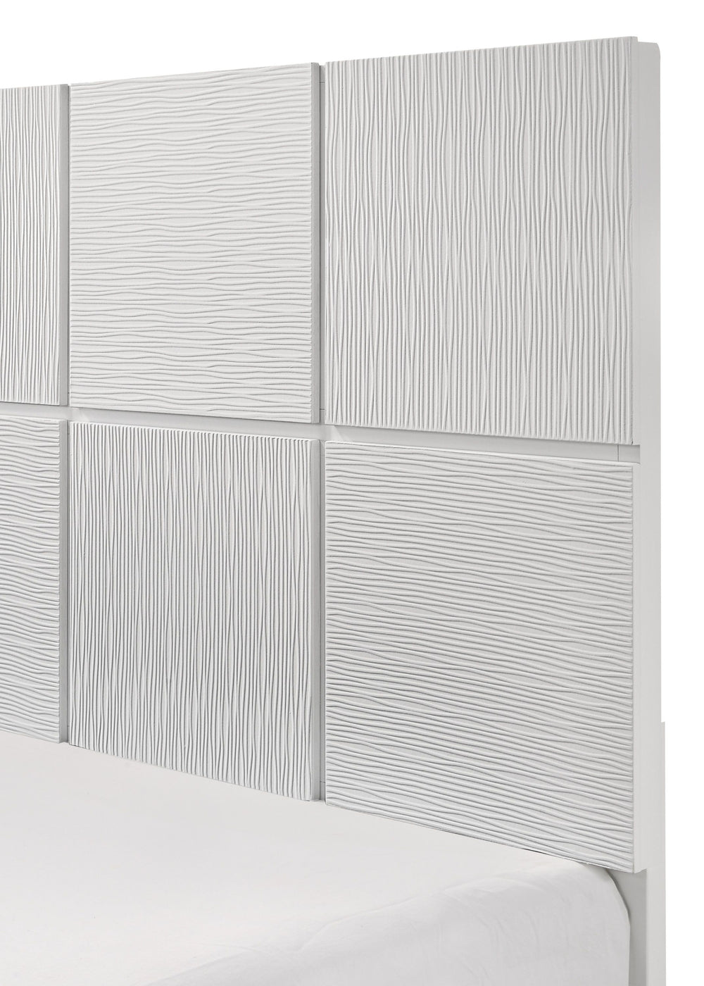 This bedroom collection is the embodiment of sleek, contemporary design, characterized by its crisp white finish and distinctive textured front panels. The centerpiece, a chic bed with a statement headboard, features geometric paneling that adds depth and