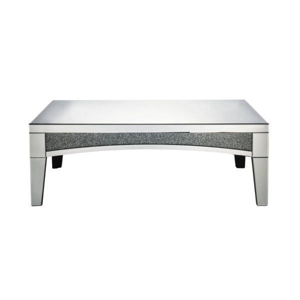 Brighten up your empty living room with the Nowles occasional table. This table offers a mirrored top and arched apron with faux stone inlay. The structure built from composite wood and mirrored panels covering every surface. A glam display table that nat