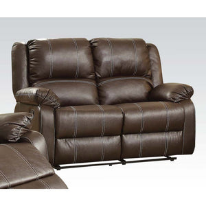The Zuriel reclining sofa collection is a wonderful choice for any family room, combines luxurious faux leather with the comfort of padded, reclining seating. Comfortable contoured seats, soft to the touch while the reclining footrests offer full leg supp