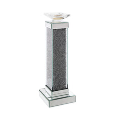 The Rekha candle holder collection fills your home with soothing scents and the simulating look of natural light. It is crafted from manufactured wood and features a mirrored frame with beveled edges and acrylic inlay. Available in two different sizes, ac
