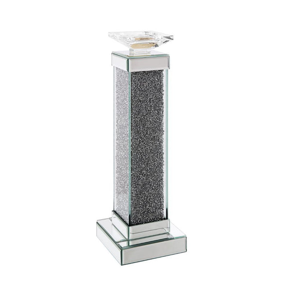 The Rekha candle holder collection fills your home with soothing scents and the simulating look of natural light. It is crafted from manufactured wood and features a mirrored frame with beveled edges and acrylic inlay. Available in two different sizes, ac