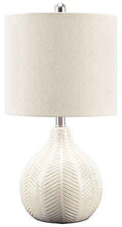 Reflect your effortlessly chic sensibility with this artful ceramic table lamp. Its textural surface is enriched with a herringbone pattern and a gorgeous glaze for a hint of sheen. Whether your look is clean and modern or cool and eclectic, this lamp is 