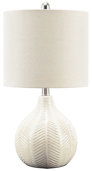 Reflect your effortlessly chic sensibility with this artful ceramic table lamp. Its textural surface is enriched with a herringbone pattern and a gorgeous glaze for a hint of sheen. Whether your look is clean and modern or cool and eclectic, this lamp is 
