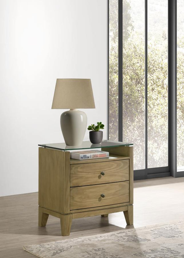  featuring a natural pine finish that exudes a warm and inviting aura. Its top drawer offers cord management access