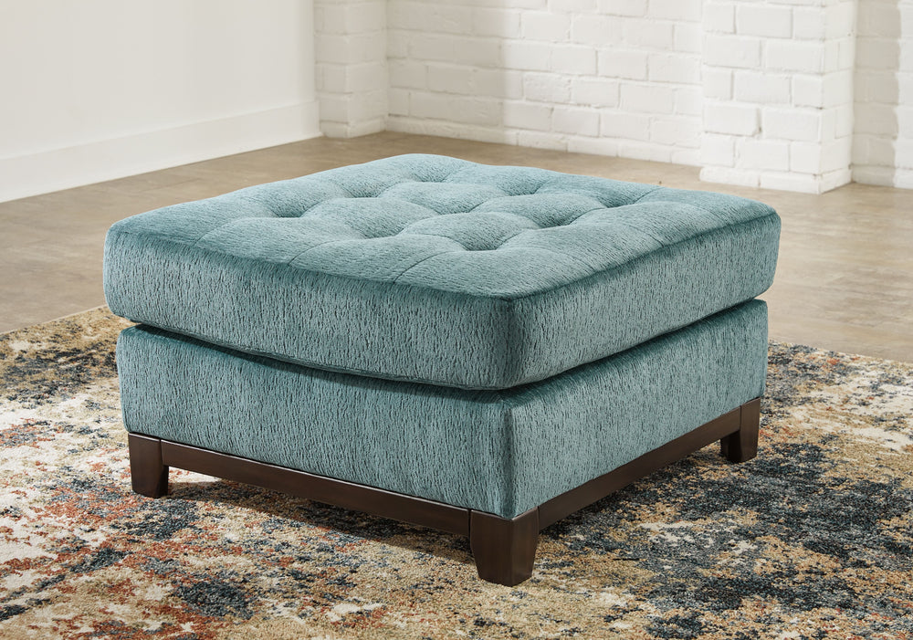 Express your uniquely chic style with this oversized ottoman. Its fresh approach to color creates a vibrant yet refined vibe in your living room that friends and family will love to lounge in. And you can count on classic comfortâ€”the plush upholstery ke